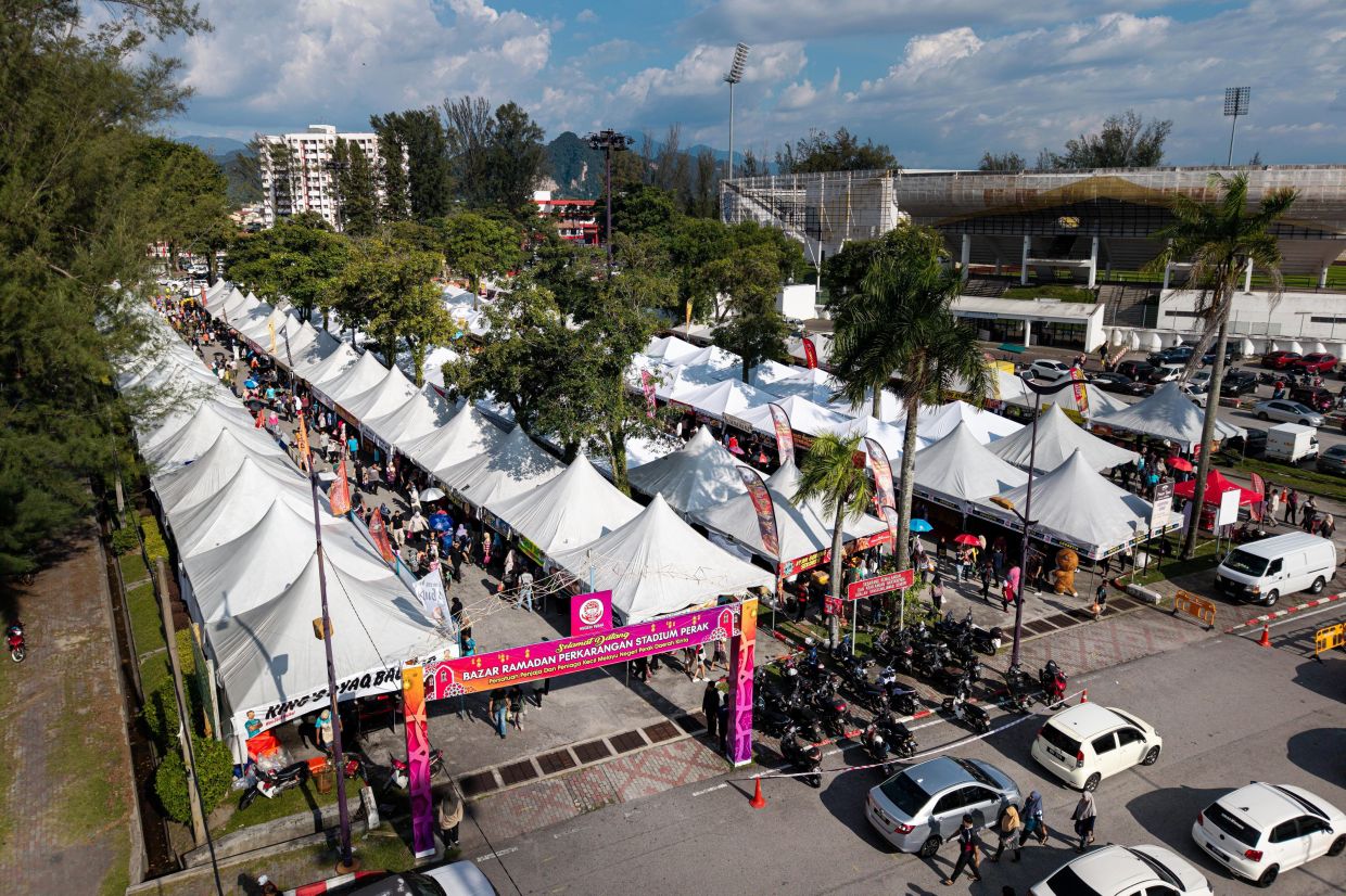 Visitors making a beeline for the Ramadan Bazaar at the Perak Stadium grounds in Ipoh. - Photo: Bernama