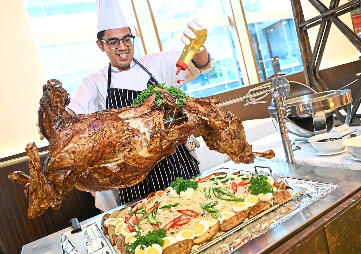 Grilled whole lamb served with Pulao Rice.
