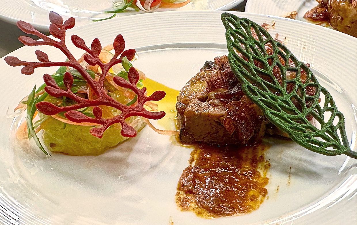 Smoked Short Rib Rendang and Free-range Chicken in Rich Coconut Milk with Spicy Chili at DoubleTree by Hilton Damai Laut Resort.