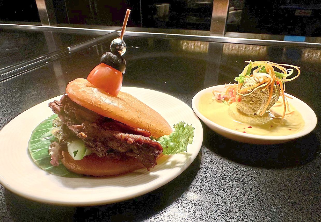 Mantou Buns with Sichuan Barbecued Lamb (left) and Steamed Meatballs with Onions and Chilli Preserves in Thick Chilli Padi Gravy at Hilton Petaling Jaya.