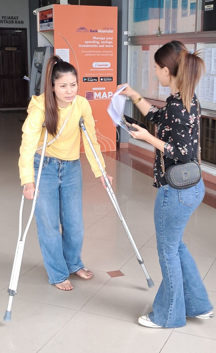 The accused leaving the court complex after posting bail.