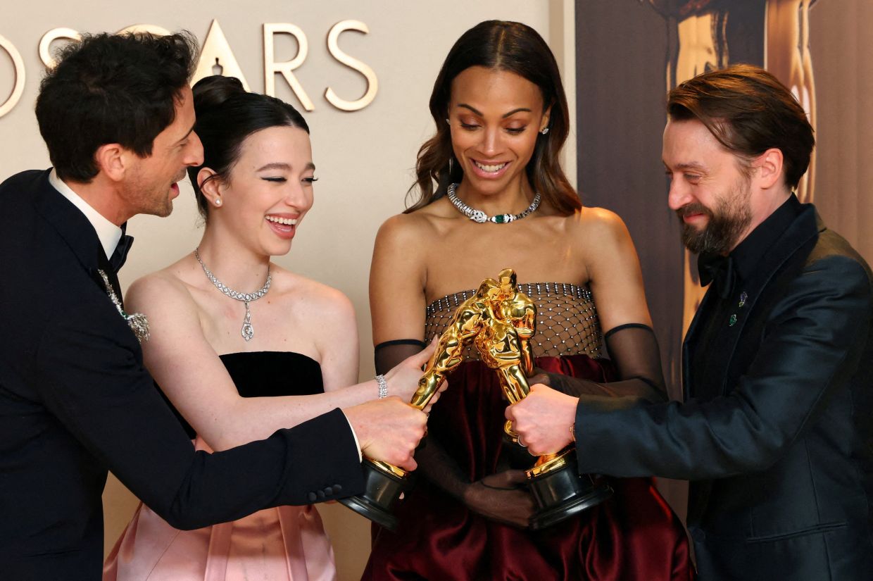 Mikey Madison, winner of the Oscar for Best Actress for 'Anora', Adrien Brody, winner of the Oscar for Best Actor for 'The Brutalist', Zoe Saldana, winner of the Oscar for Best Supporting Actress for 'Emilia Perez', and Kieran Culkin, winner of the Oscar for Best Supporting Actor for 'A Real Pain', pose in the Oscars photo room at the 97th Academy Awards in Hollywood, Los Angeles, California, U.S., March 2, 2025. Photo: Reuters