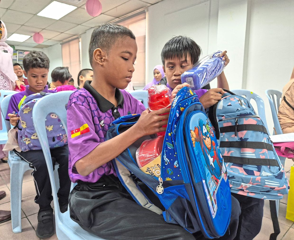 The Back To School event provided 245 visually impaired students from nine schools in the Klang Valley with essential school supplies.
