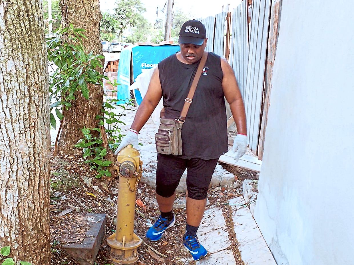 Alvin often finds hydrants hidden by illegal structures, parked cars and overgrown vegetation.