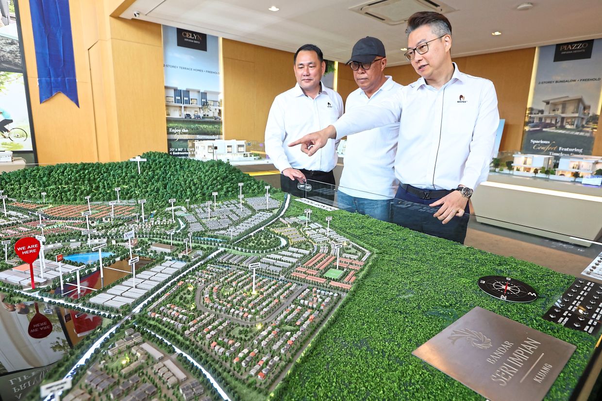 (From right) Chai, X Park general manager Philip Phua and Matrix Concepts general manager (southern region) Damon Lau looking at the proposed extreme sports park site within Bandar Seri Impian.