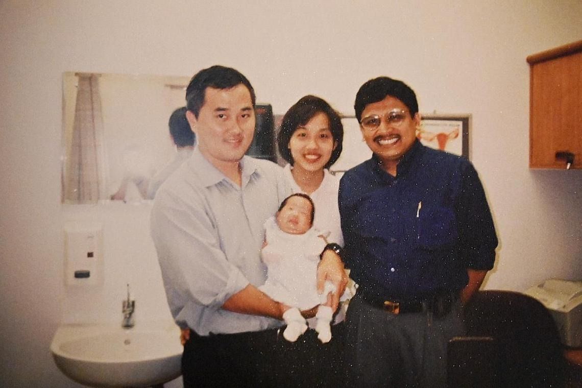 Father Lee Eng Chuan (left) with baby Karuna, along with mother Magdaline Tan and Prof Arijit Biswas. - Photo: courtesy of Magdaline Tan