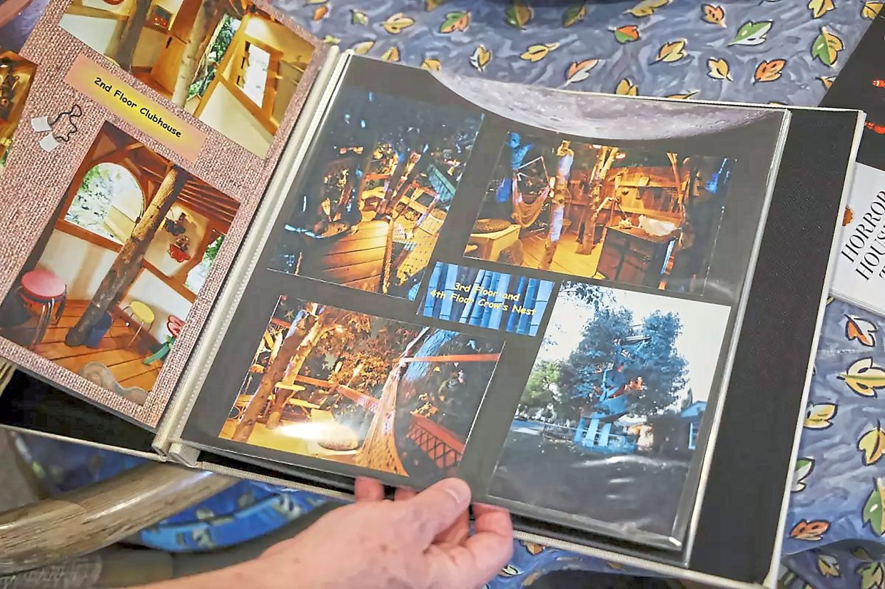 A scrapbook commemorates the tree house.