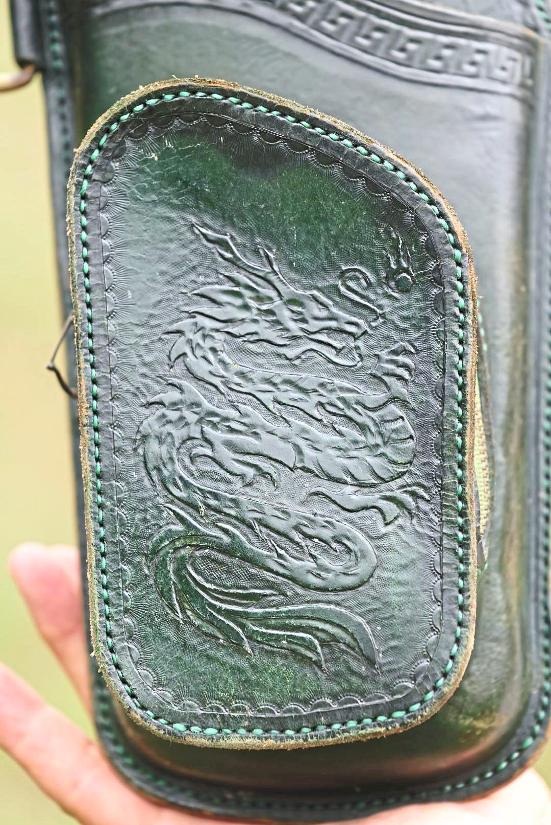 An intricate dragon motif on the handmade leather quiver.