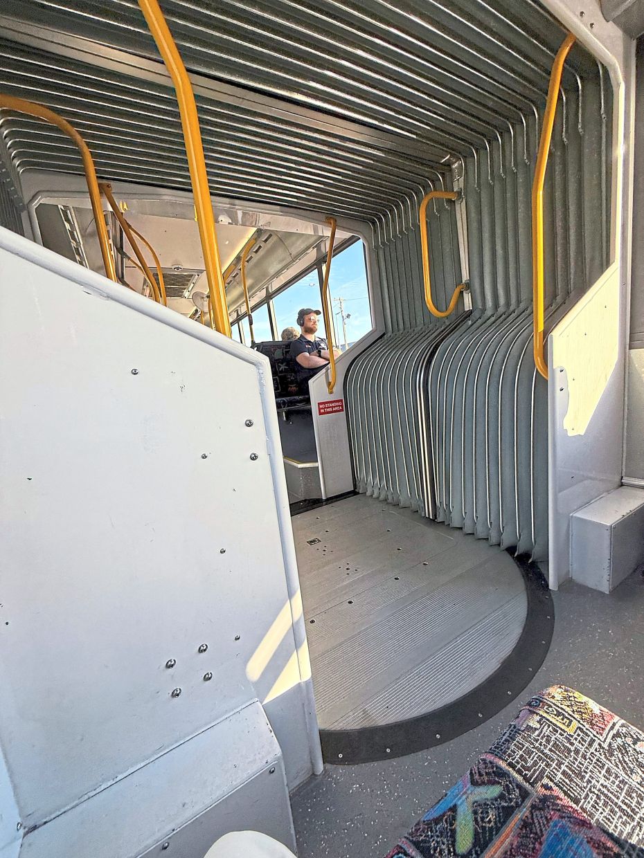 The view inside an articulated bus in Perth showing the joint between two sections. 