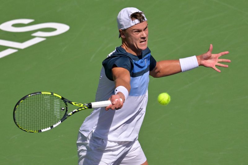 Tennis-Rune battles past Medvedev to reach Indian Wells final