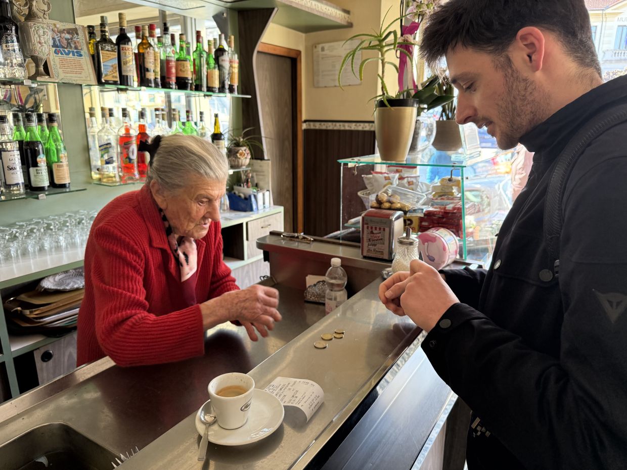 Anna Possi has been tending the coffee machine in the Italian village of Nebbiuno since 1958. Photo: Christoph Sator/dpa