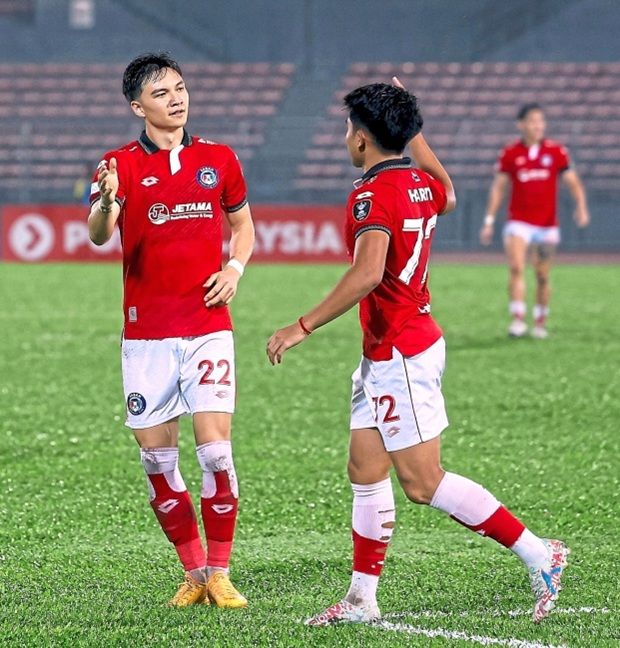 Sharpshooter: Sabah’s Stuart Wilkin (left) celebrating with a teammate after scoring against Putrajaya Athletic in a Malaysia Cup match. — Bernama