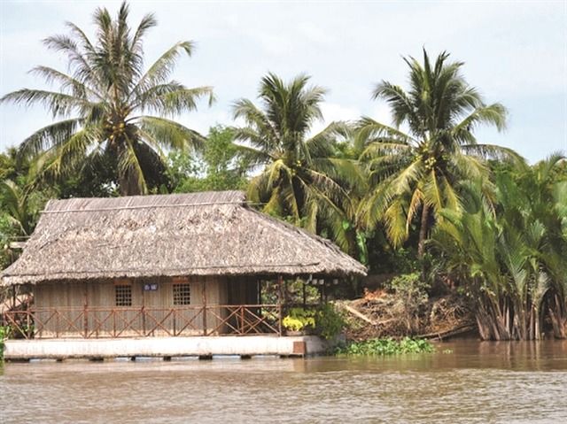 A nipa-leaf-roofed house in Miet Thu. - Photo: VNS
