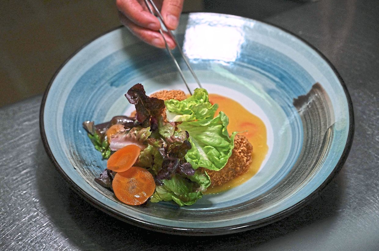 A dish made from a wild fruits including camu-camu, copoazu and sour guava that is served at a restaurant in Bogota.