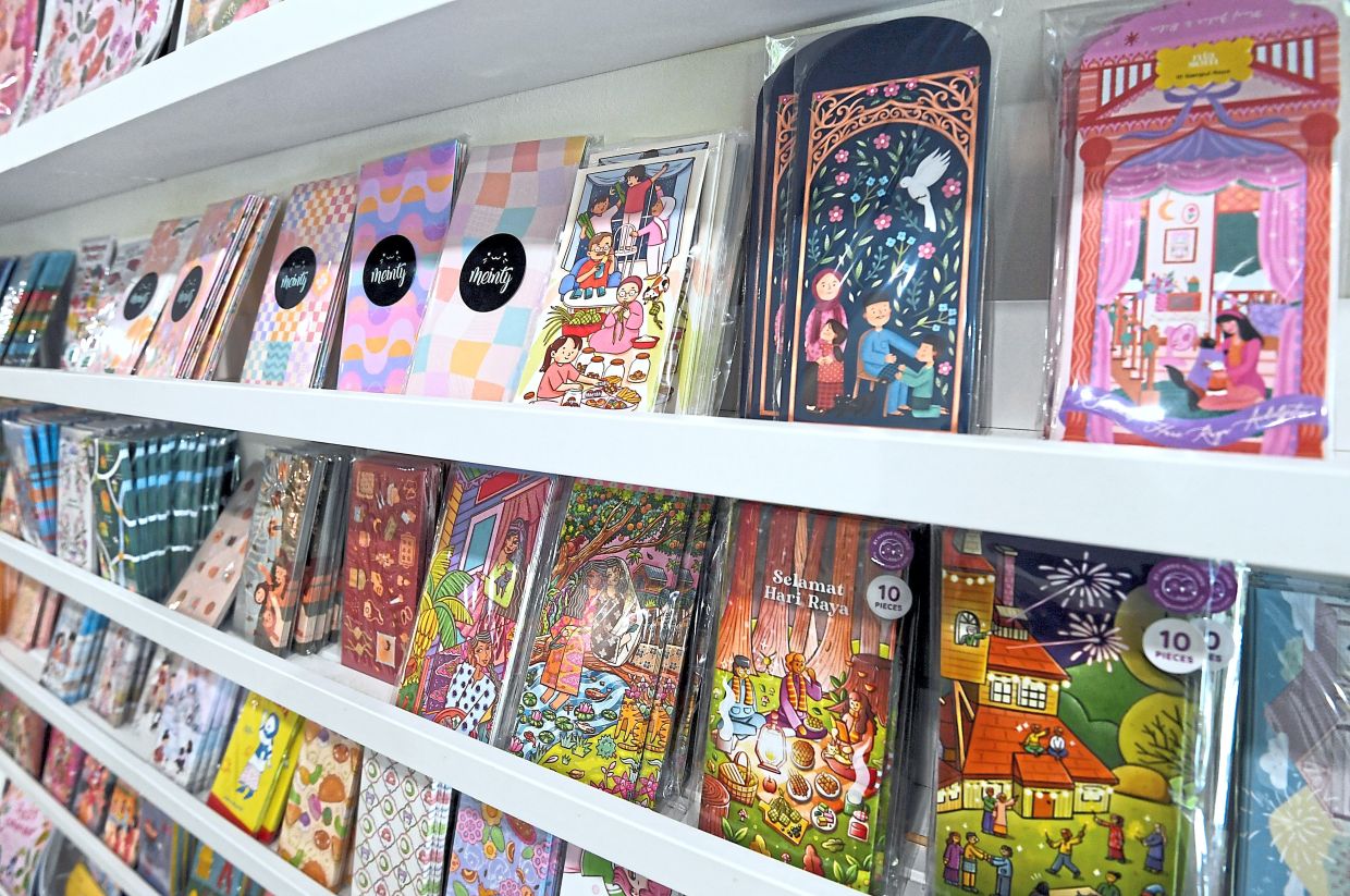 With over 100 designs by local and South-East Asia artists, the Mari! Ke Kedai shop offers unique sampul raya for collecting and gifting. Photo: The Star/Azhar Mahfof 
