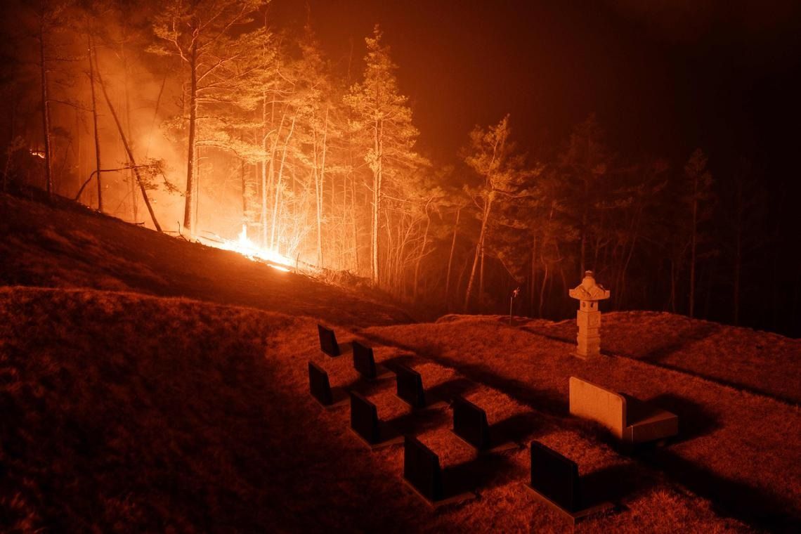 The fire ripping through Andong city, in South Korea, was reportedly set off by someone tending an ancestral grave site. -- PHOTO: AFP