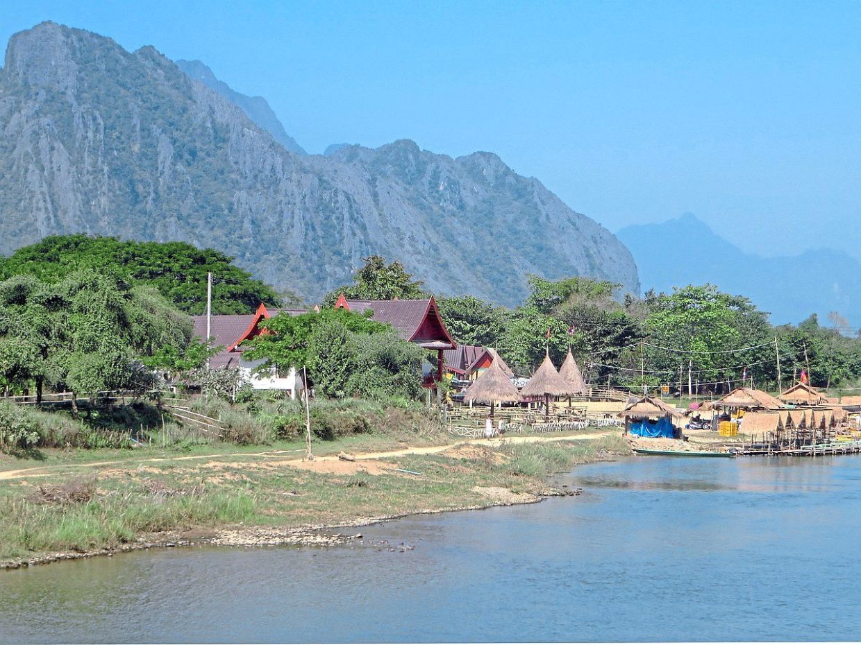 Vang Vieng is surrounded by limestone karst mountains.
