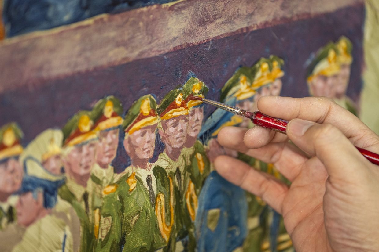 A close-up of one of Chow's paintings, capturing China's influence over Hong Kong. Photo: AP