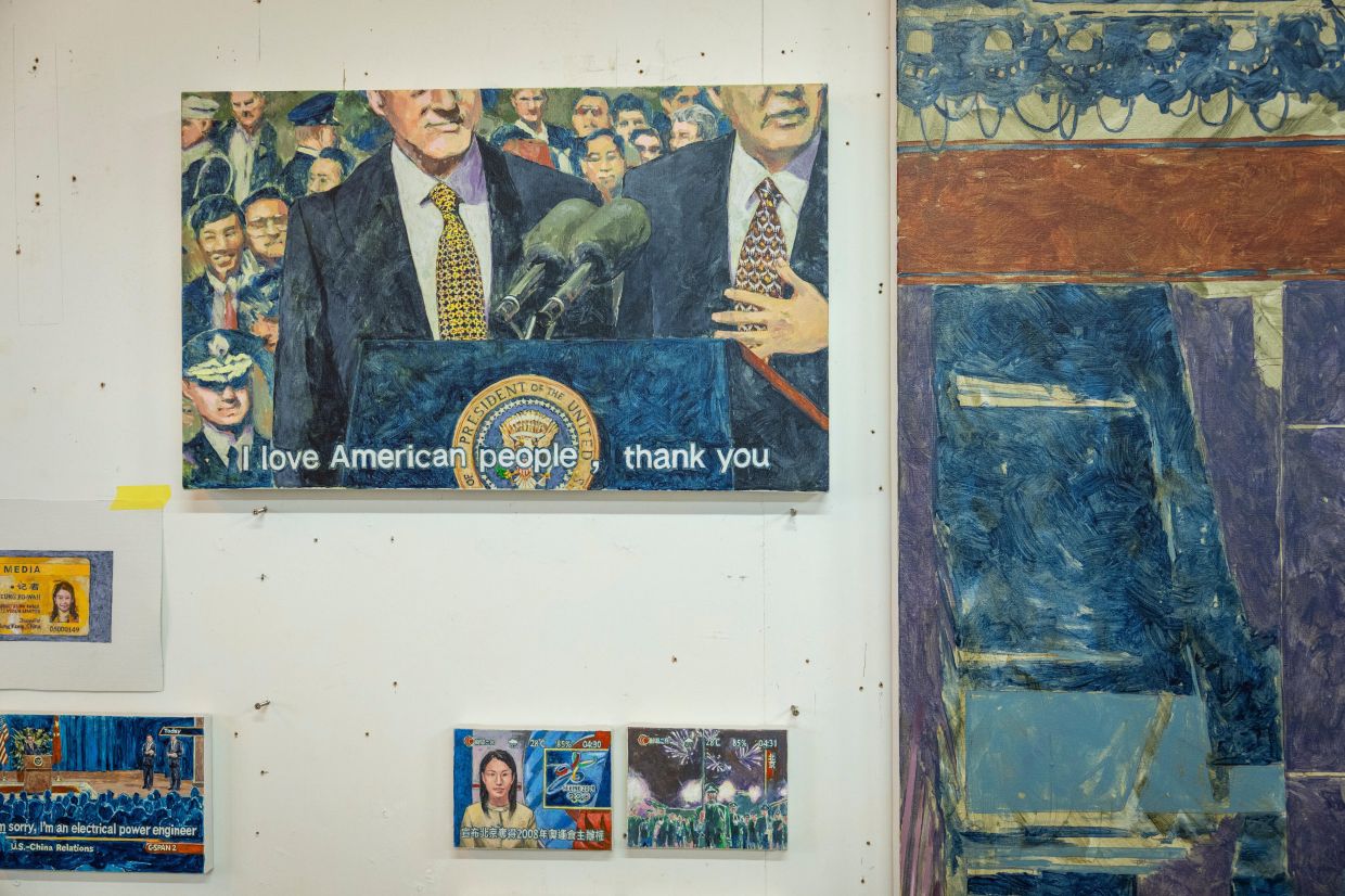 A collection of paintings by artist Chow fills his Hong Kong studio, each capturing moments from China and Hong Kong’s evolving social and political landscape. Photo: AP
