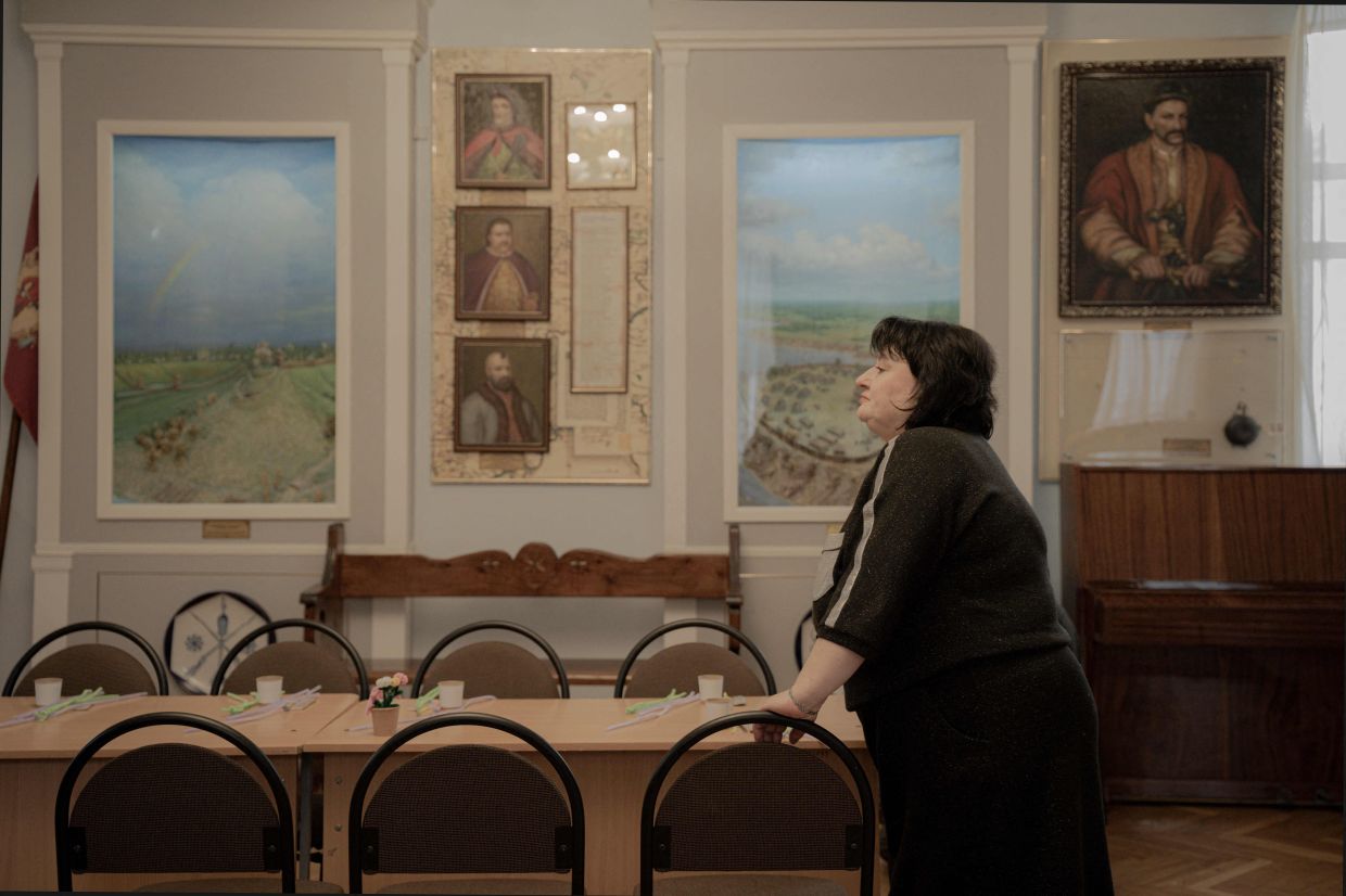 Natalia Bilan, director of the Historical and Cultural Reserve of the Battle of Poltava Museum, stands in a hall of the museum in Poltava. Photo: AFP