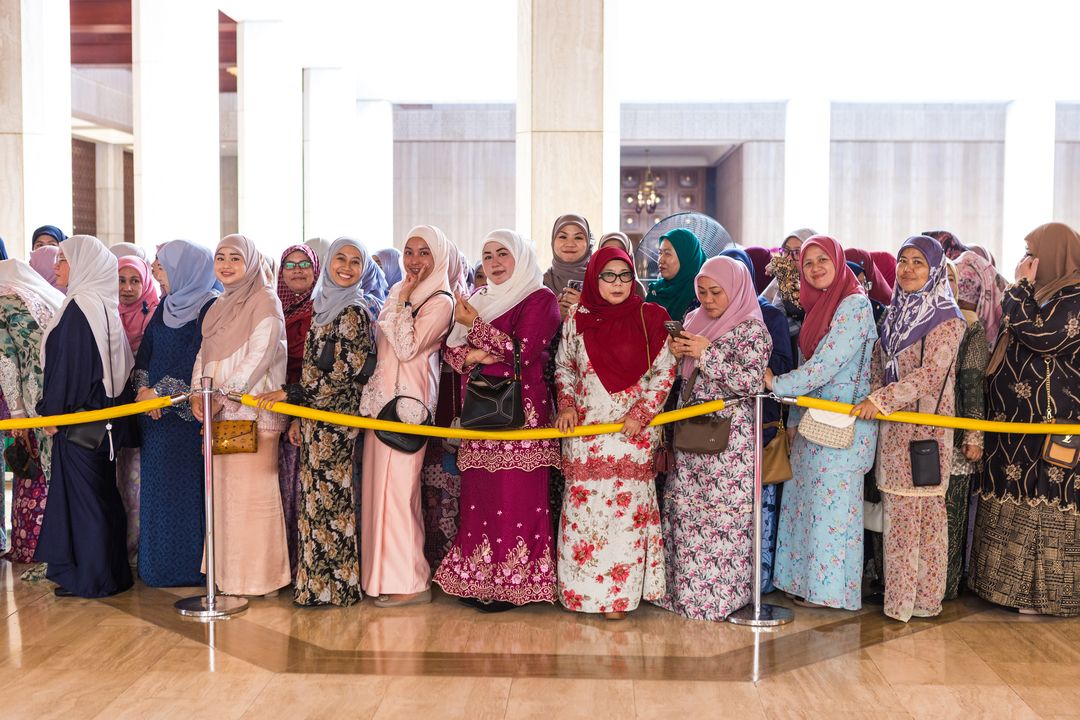 Visitors lining up to meet members of the royal family. - Photo: Borneo Bulletin