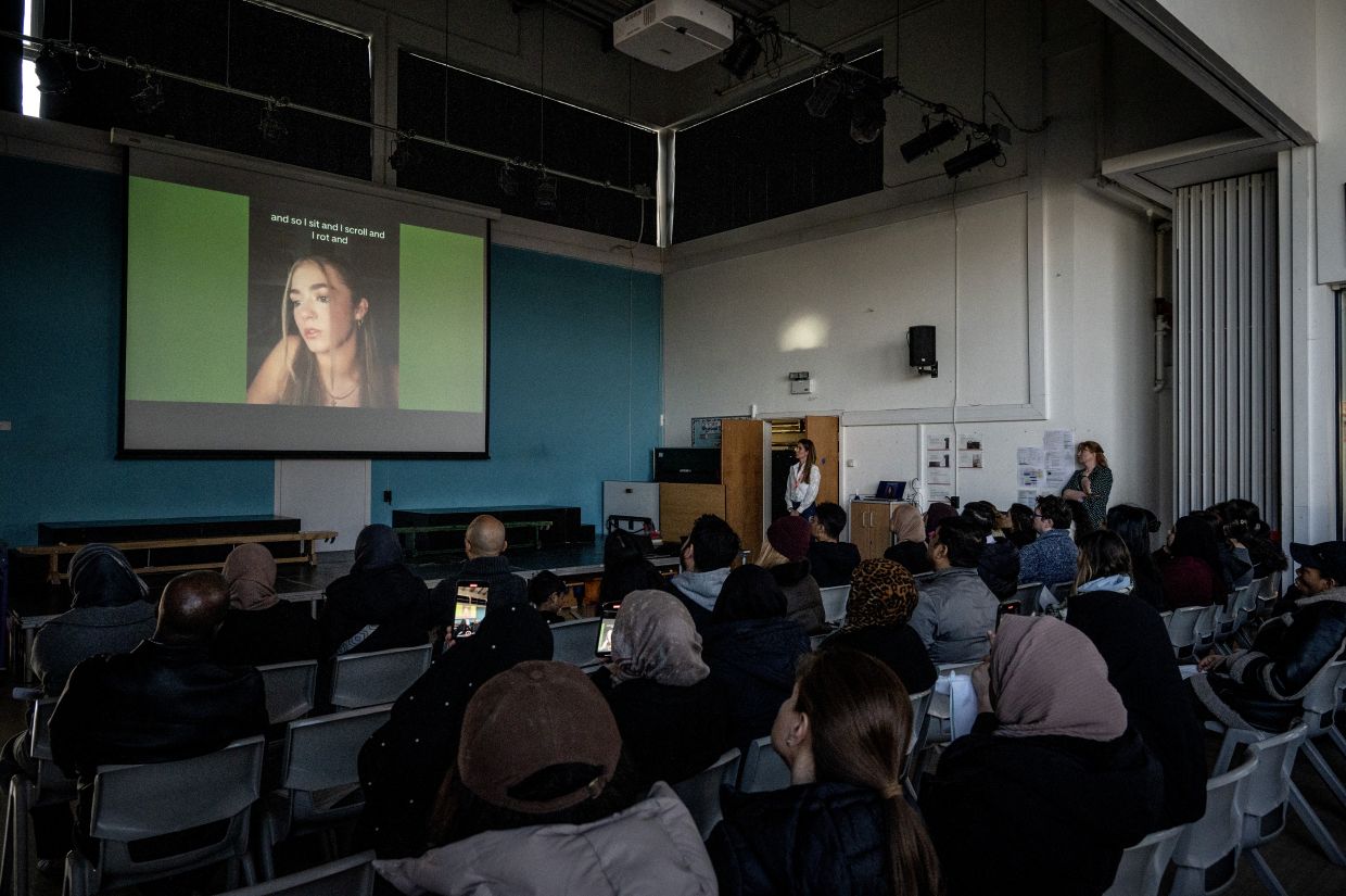 Nova Eden, a regional leader for Smartphone Free Childhood, gives her presentation on smartphones and young people at Colindale Primary School in north London on March 7, 2025. — Photos: MARY TURNER/The New York Times