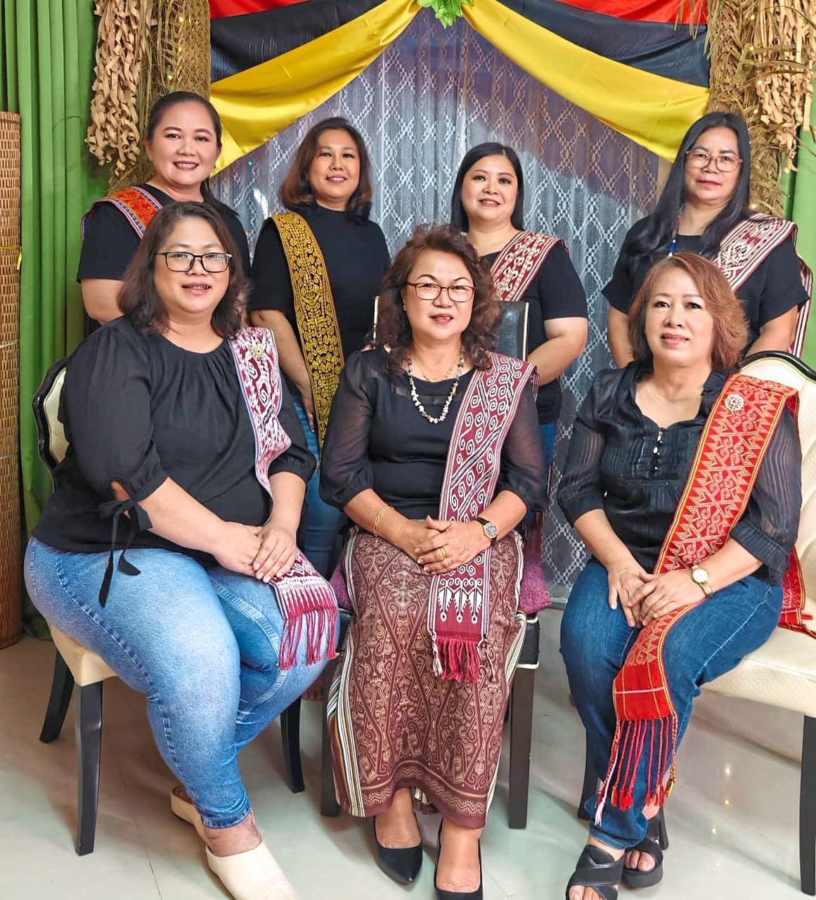 Angelyn (seated centre) with the event organising committee chaired by Senorita (seated left).