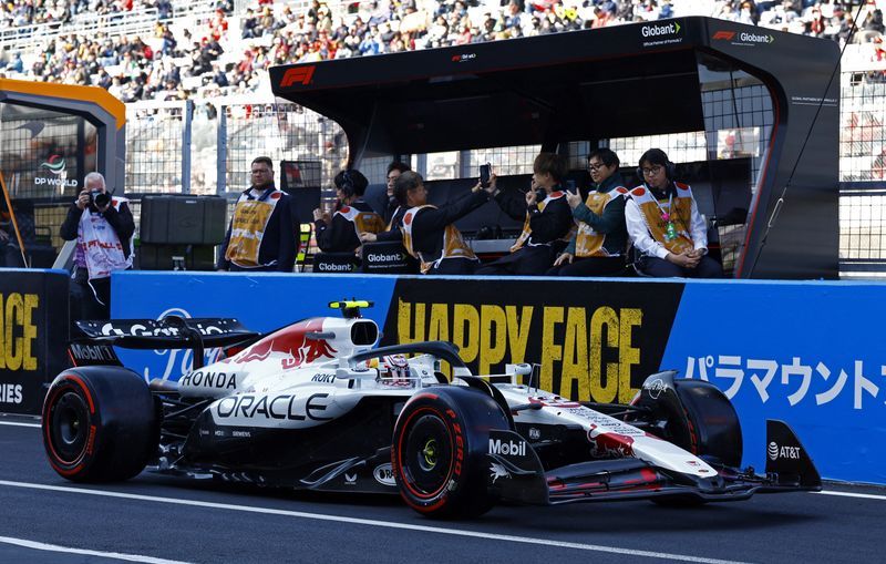 Motor racing-Japan's Tsunoda hits his mark on first outing with Red Bull