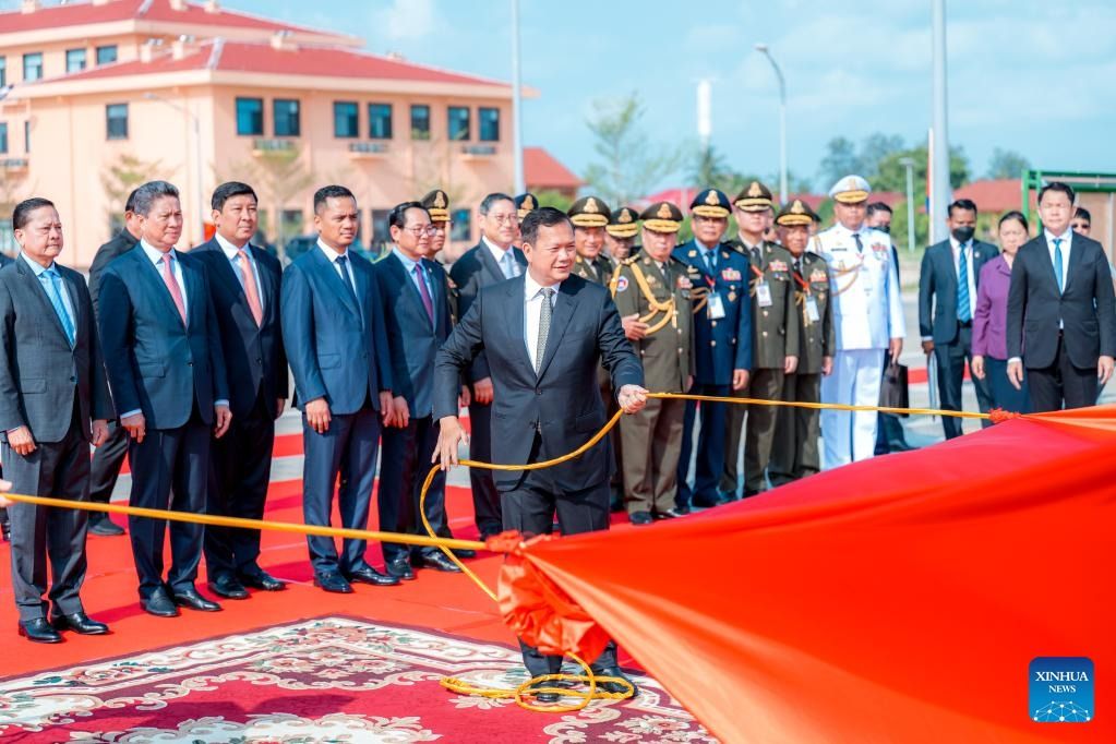 Cambodian Prime Minister Hun Manet (front) unveils the plaque of a Cambodia-China Joint Support and Training Centre in Sihanoukville, Cambodia, on April 5, 2025. A Cambodia-China Joint Support and Training Centre at Port Ream here in southwestern Cambodia was put into operation on Saturday (April 5, 2025). - Photo: Xinhua