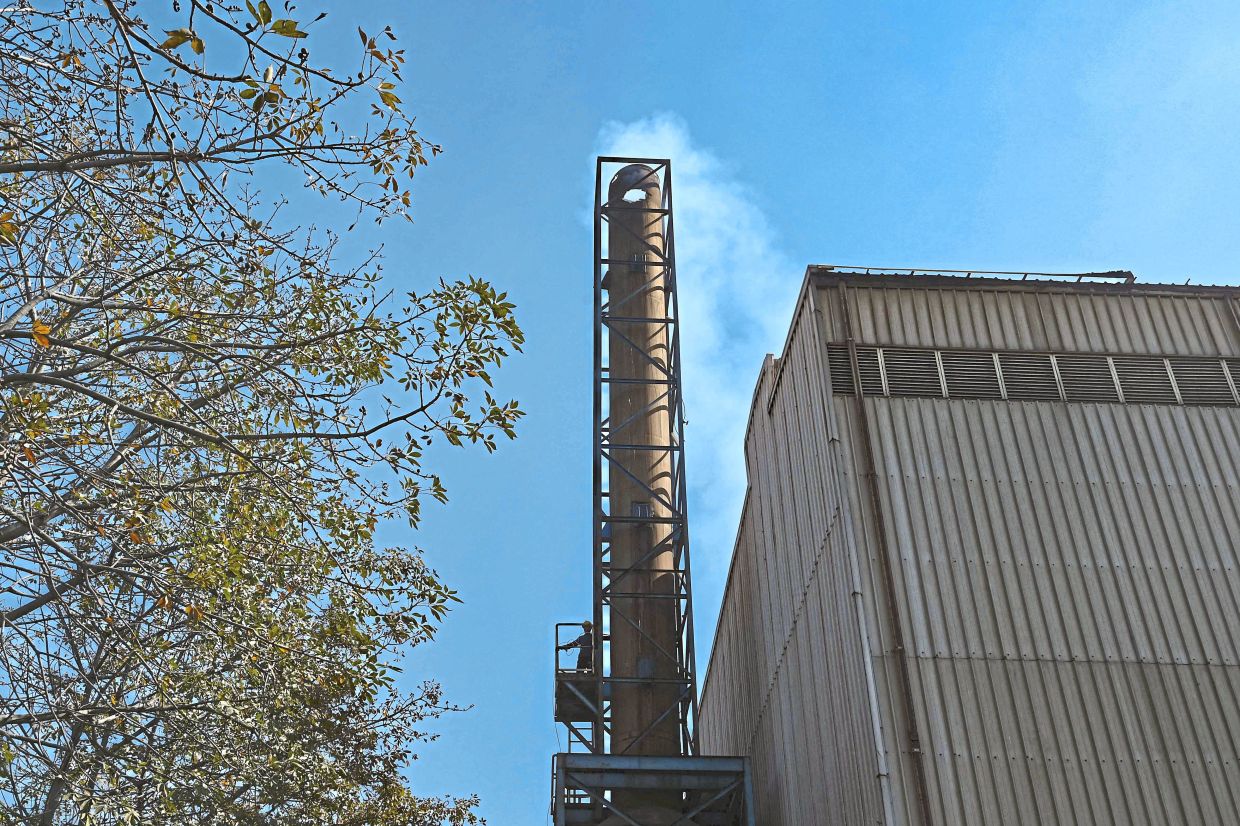 Source of pollution: Smoke billowing from the chimney of a factory in Lahore. Tens of millions of Pakistanis have spent at least four months breathing toxic air pollution 20 times above safe levels in the worst winter smog season for several years. — AFP