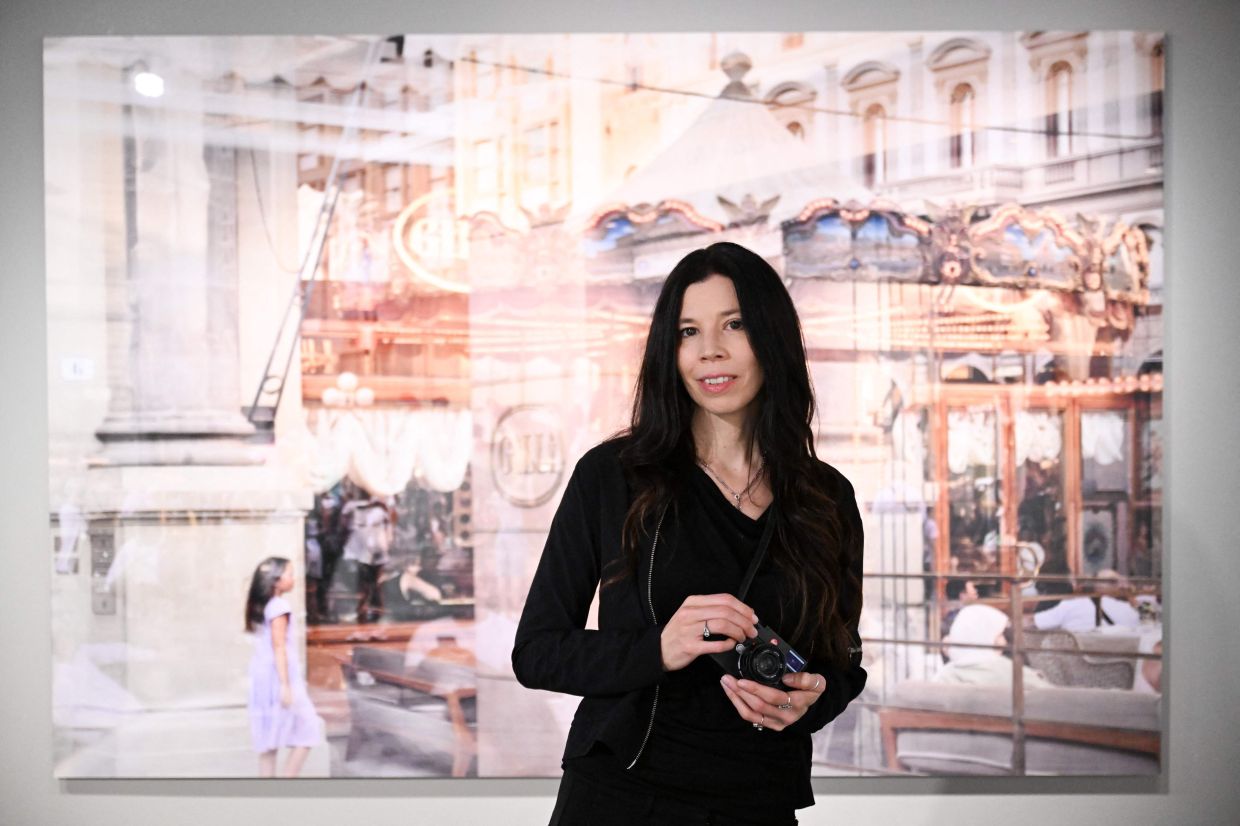 Stuenkel's compact Leica is the perfect camera for the job, the 51-year-old said. — AFP