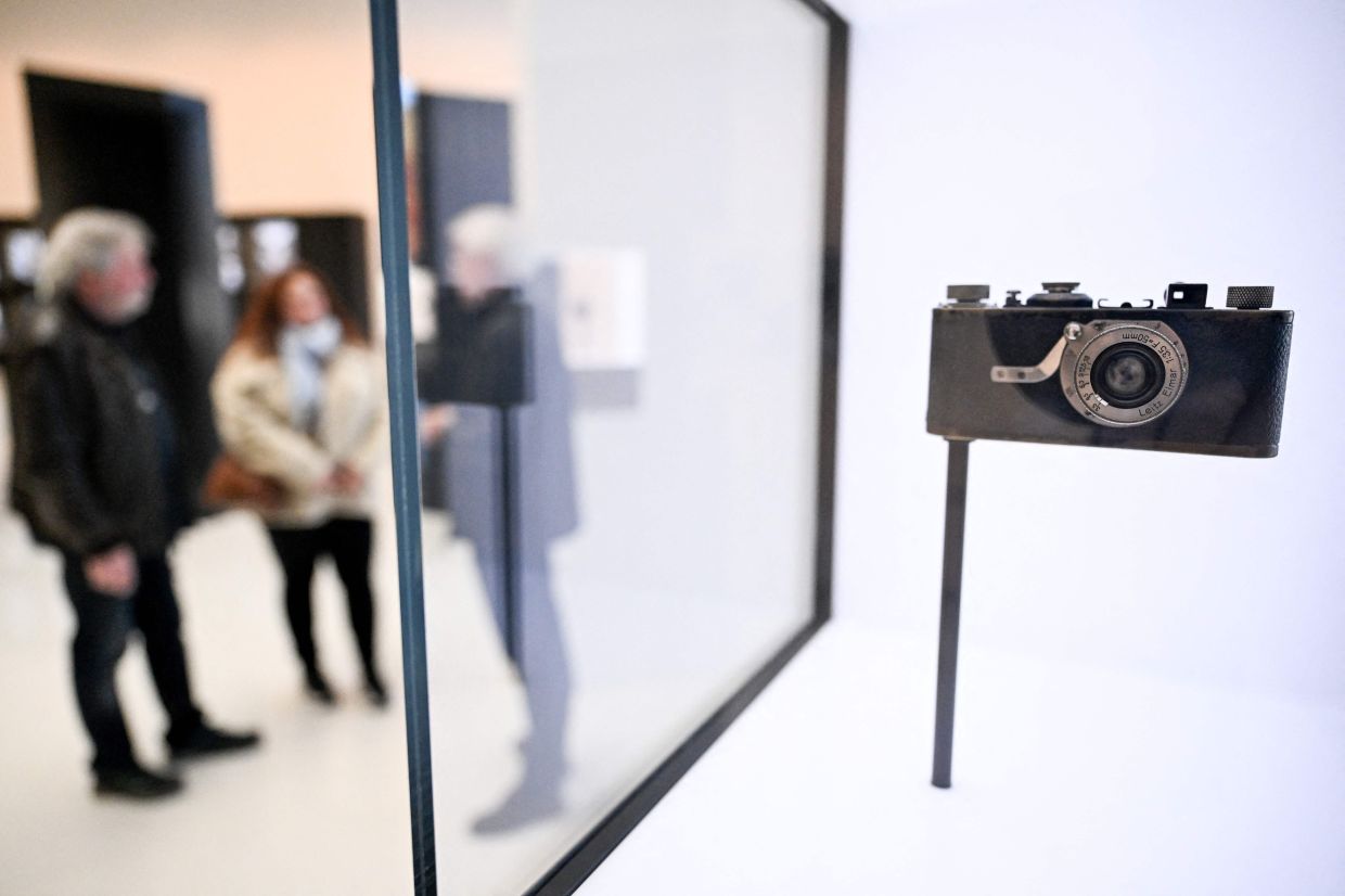 The first Leica camera from 1925 is pictured on the historical stand at the Leica factory in Wetzlar, western Germany. — AFP