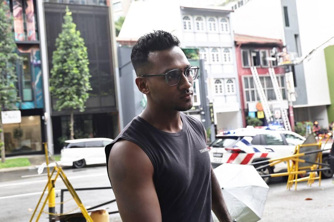 Shaik Amirudin, who owns the nearby Flex Fitness studio, said he heard a loud noise before a client who was leaving the studio told him about the smoke. - ST 