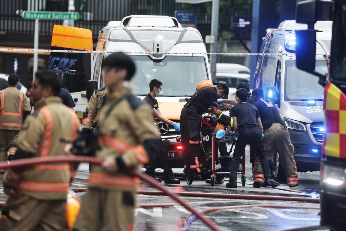 Fire and medical crew at the scene of the fire at River Valley. - ST