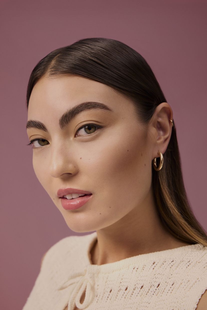 Barely-there makeup enhances your skin with very light coverage foundation, soft contouring and almost no other makeup. Photo: Rare Beauty