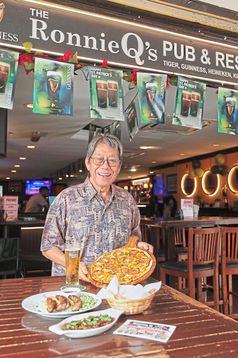 Quay with the Pizza Margherita, bangers and mash (centre) and lamb ‘varuval’ with toasted bread (front).