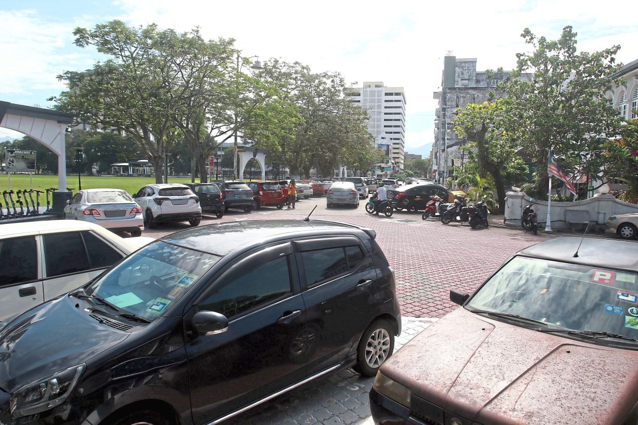Parking in the old town becomes worse whenever there is an event at Ipoh Padang (left).