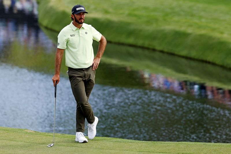 Golf-Fore! Caddie blocks Homa's shot at Masters