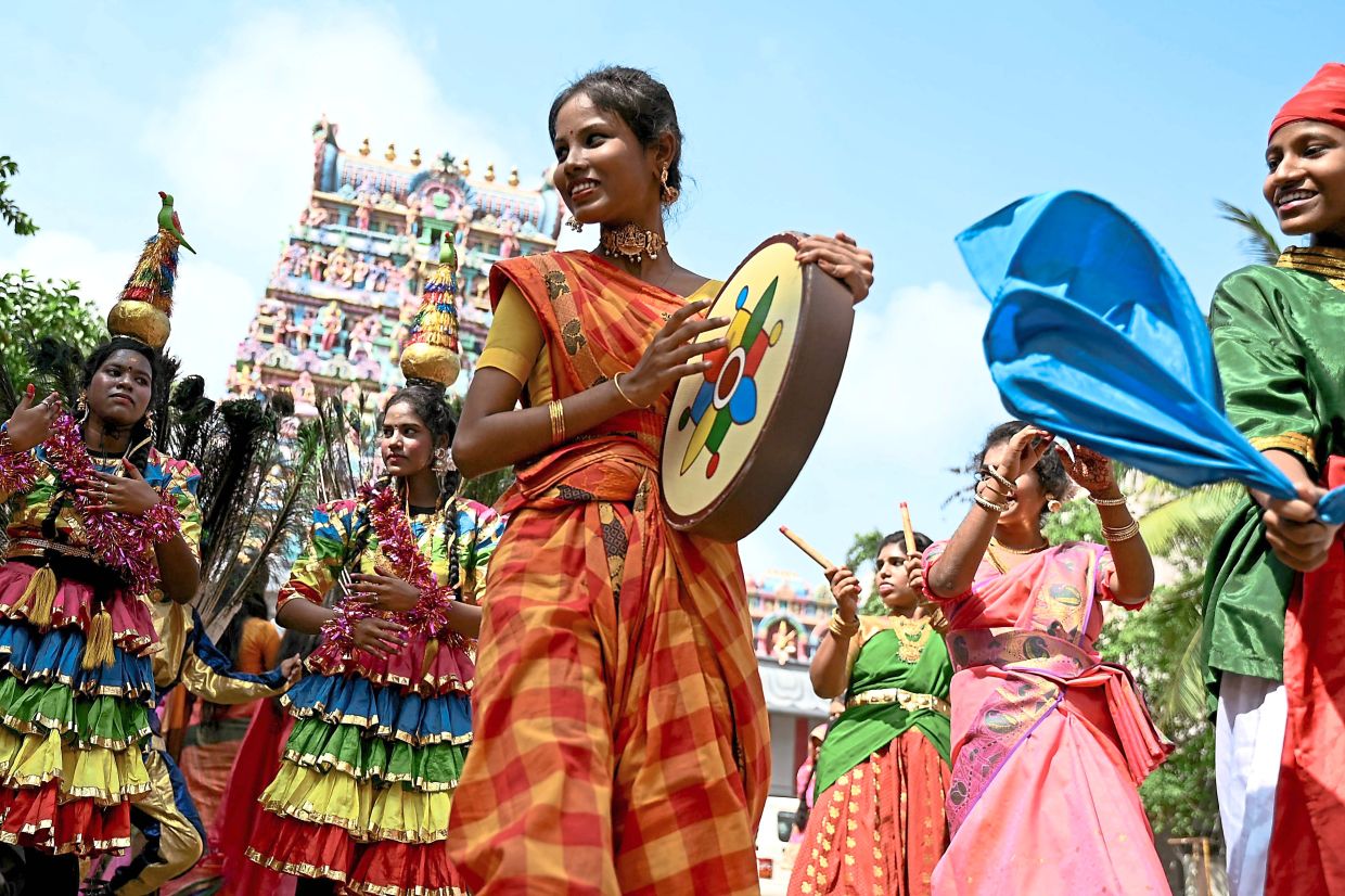Students perform traditional dance as they take part in Pongal celebrations, the Tamil harvest festival, at a college in Chennai in January 2024. Photo: AFP