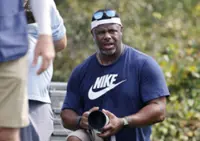Golf-Baseball Hall of Famer Griffey Jr. working as photographer at Masters