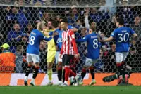 Soccer-10-man Rangers hold Bilbao to Europa League goalless draw