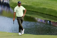 Golf-Fore! Caddie blocks Homa's shot at Masters