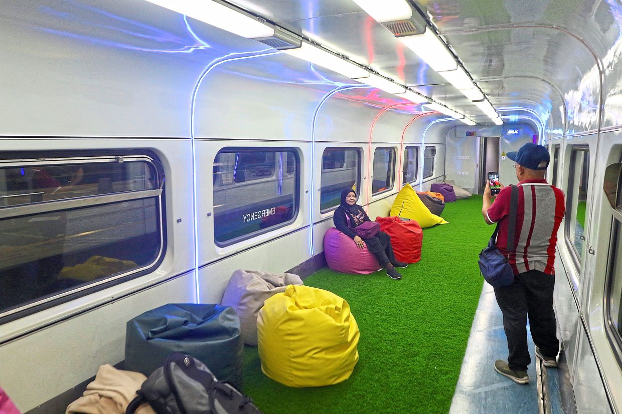 A passenger enjoying the Chillax space during JNK3.