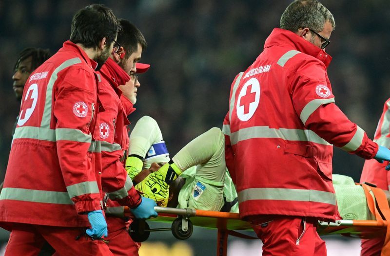 Soccer-Injured Maignan to return to Milan after overnight hospital stay