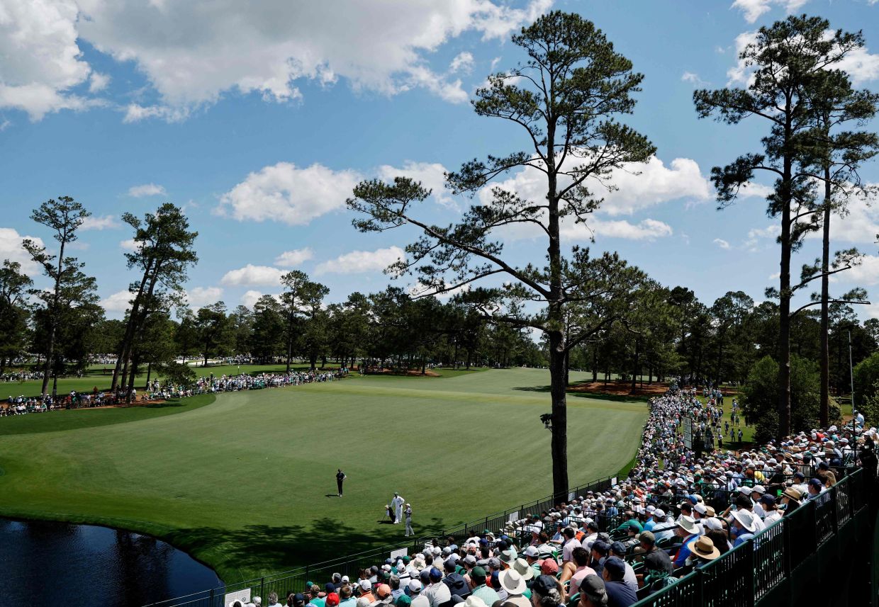 Amateur Hiroshi Tai of Singapore plays a shot on the 15th hole during the second round of the 2025 Masters Tournament at Augusta National Golf Club in Augusta, Georgia. -- Harry How/Getty Images/AFP 