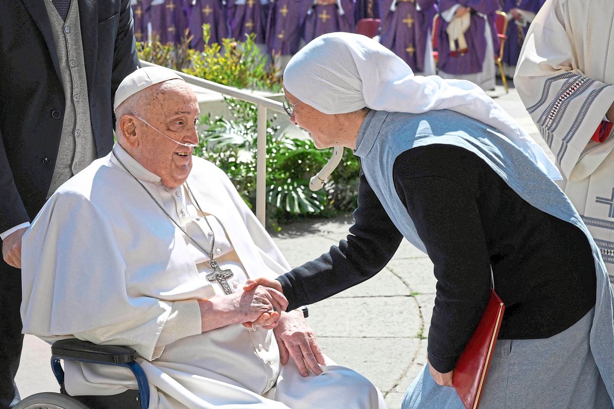 The 88-year-old Pope Francis, seen here during a surprise appearance at the end of a mass for the sick and healthcare workers on April 4 in Vatican City, is still recovering after being hospitalised for double pneumonia. — AFP/Vatican Media