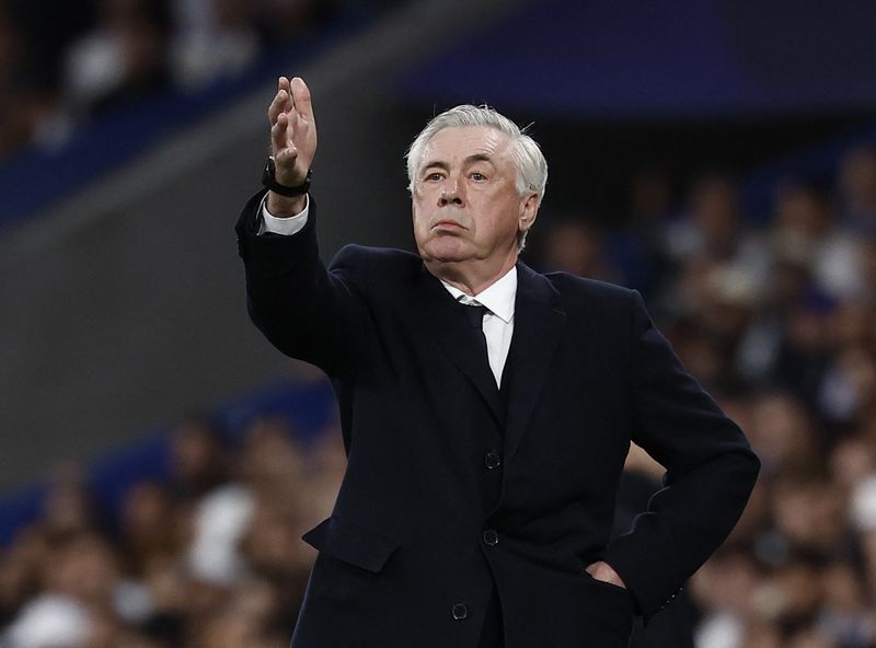 Soccer-No complaints from Ancelotti, as Real humbled by Arsenal