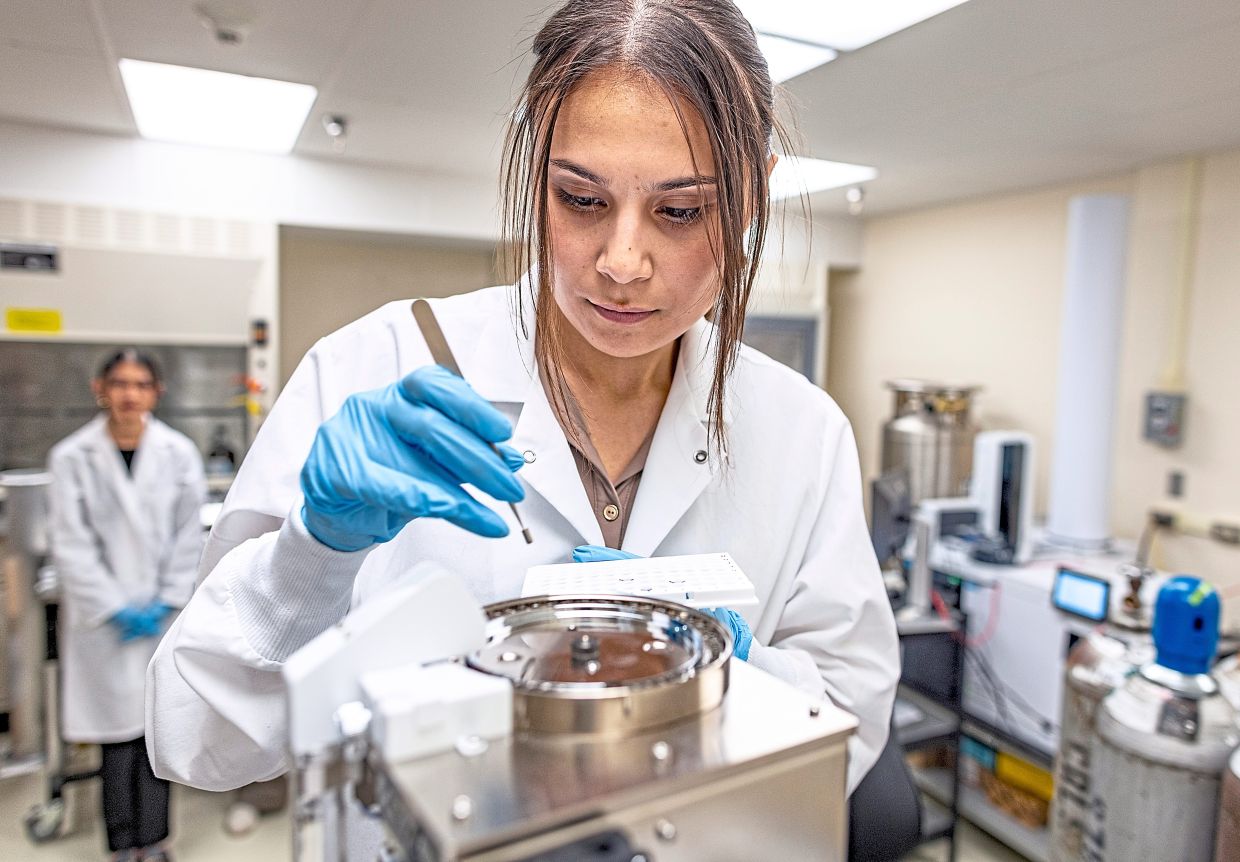 A researcher studying microplastics content in samples at the lab. - — Gabriela Campos/The New York Times