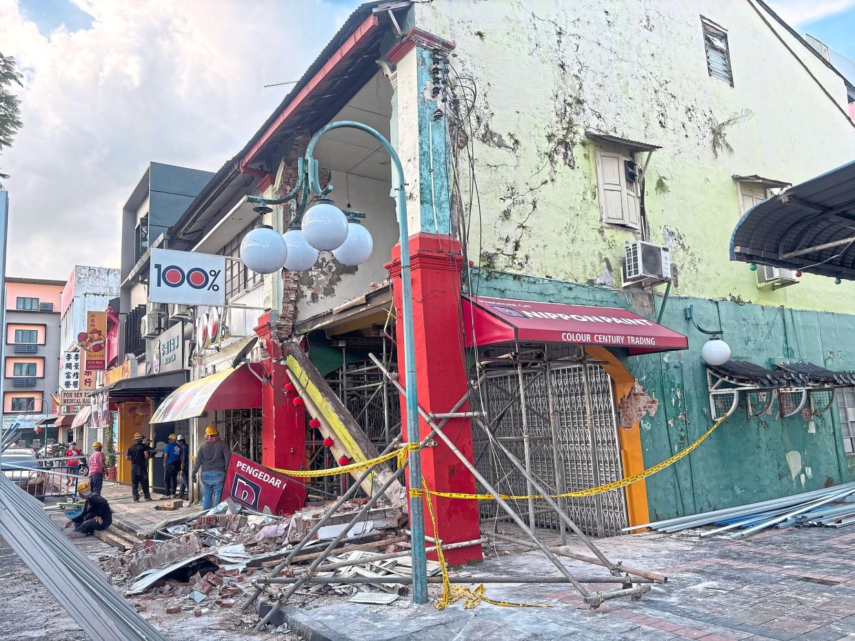 The damaged century-old shophouse in Jalan Padungan. — Photo courtesy of Kuching South City Council