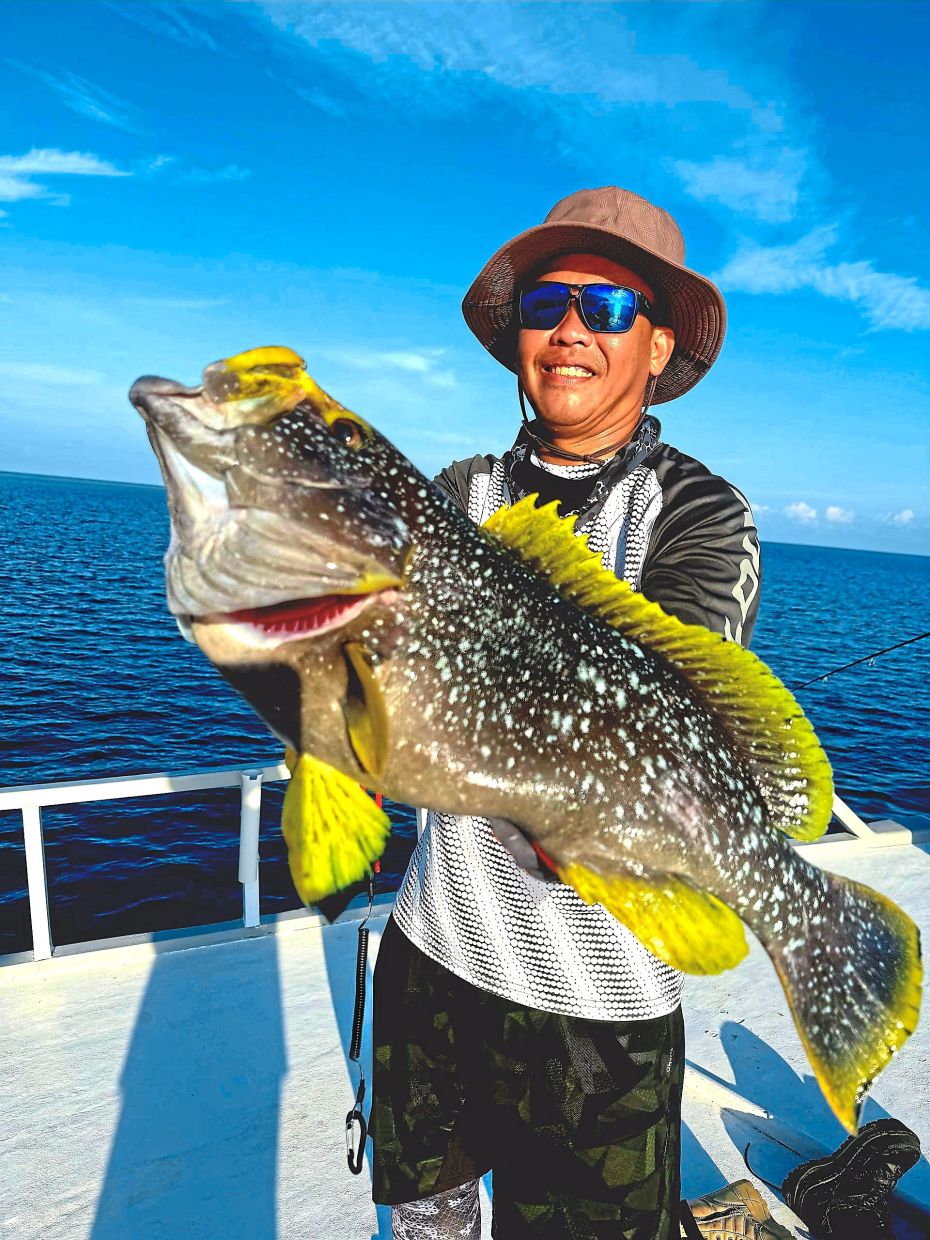 Gan and a large yellowfin grouper which can fetch up to RM2,200/kg in Hong Kong.